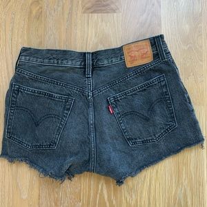 Levi’s black 501 denim women’s black jean shorts, cut off style. Size 28